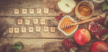 Rosh Hashana Jewish Holiday Concept - Apples, Honey, Pomegranate