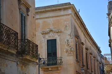 Italy, Lecce, ancient buildings and streets of the old town, views and details, doors, windows and various architectures.