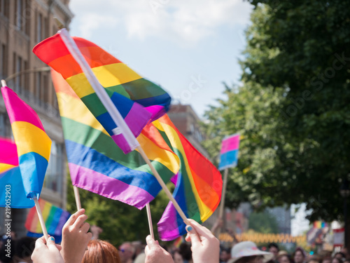 Fotografía Flags of gay pride float in the air during parade in Montreal, Canada