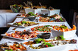Party Brunch big Buffet table setting with Food Meat Vegetables