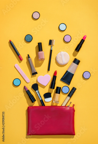 Download Beauty Background With Makeup Cosmetic Products Photo Of Red Makeup Bag With Cosmetic Products On Yellow Background Copy Space For Your Text Buy This Stock Photo And Explore Similar Images At PSD Mockup Templates