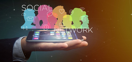 Businessman holding a colorfull social network teamwork with icon 3d rendering