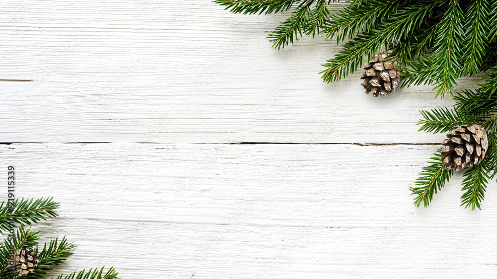Christmas Fir tree branches and pine cones background Stock Photo ...