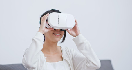 Poster - Woman play with VR device at home