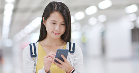 Canvas Print - Woman use of mobile phone inside shopping mall