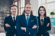 © deagreez - Stylish elegant modern confident content three business partners