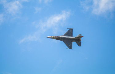 Flying Jet Through a Brilliant Blue Sky