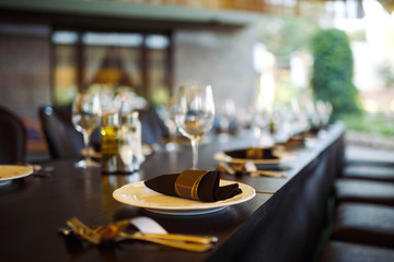 Wall Mural - Sparkling glassware stands on long table prepared for wedding dinner