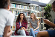 © ReeldealHD images - High school students studying together in a library