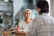 © ReeldealHD images - Female Muslim friends having coffee together in a shopping mall