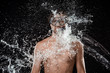 © LIGHTFIELD STUDIOS - portrait of shirtless man in swimming mask with snorkel swilled with water splash isolated on black