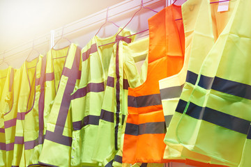 Wall Mural - Colored, reflective vests for drivers and road workers