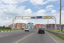 Circular Traffic At The Intersection With The Highway Near West Bypass And Road Signs With Directions Kropotkin, Yeisk, Rostov Highway And Others