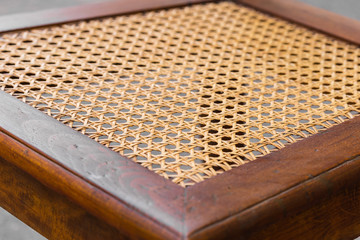 Close up of the pattern formed by open weave rattan cane