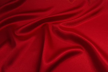 red satin or silk fabric as background