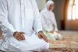 © FS-Stock - Muslim man and woman praying in mosque