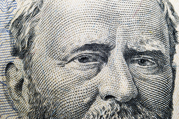 Close up view Portrait of Ulysses S. Grant on the one fifty dollar bill. Background of the money. 50 dollar bill with Ulysses S. Grant eyes macro shot. Money background. Face portrait