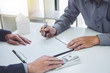 © Freedomz - Man customer signing buying home policy document agreement, successful loan contract and salesman receive money after good deal