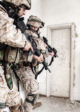 Marine Assault Team, Counter-terrorism Squad Members, Commando Fighters In Body Armor, Armed With Service Rifles, Stalking Through Corridor To Closed Door, Clearing Rooms In Abandoned City Building