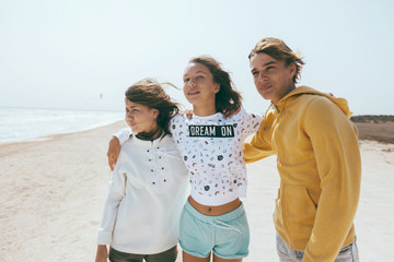 Wall Mural - Group of teenage friends outdoors