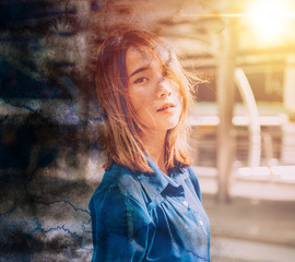 woman standing in the city double exposure with watercolor splashes