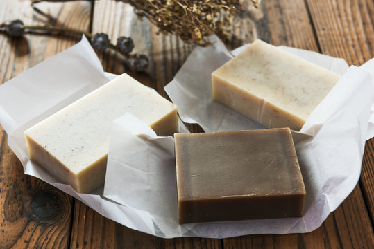 Fototapete - Handmade natural soap on wooden background