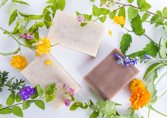 Poster - Top view of beautiful natural handmade soap with herbs.