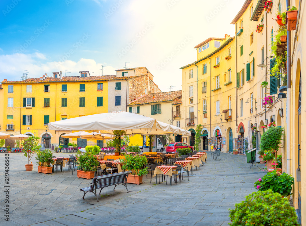 Cafe in the cozy morning lighted square of the city side. Italy. Europe - obrazy, fototapety, plakaty 