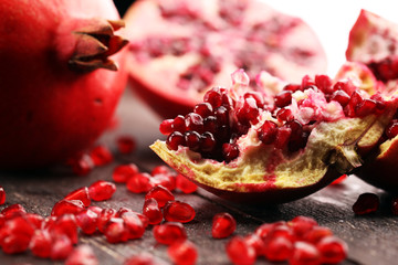 Ripe and juicy pomegranate. Red organic pomegranate.