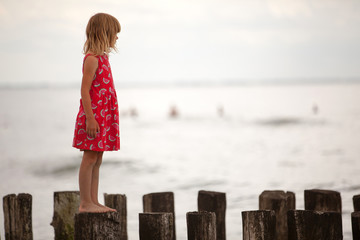 Beautiful little girl at the beach
