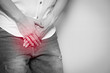 Male hands holding on middle crotch of trousers with prostate inflammation, Prostate cancer, Men's health care concept.