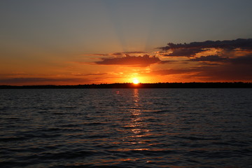 Wall Mural - Sunset on a northern Minnesota lake in July