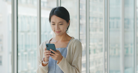 Canvas Print - Woman use of mobile phone in shopping center