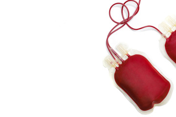 Wall Mural - Two bags of donated human blood with no labels. Isolated on white background. Top view directly above with copy space. Blood donation blood trasfusion