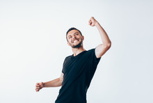 Handsome Man With Arms Up Celebrating Success