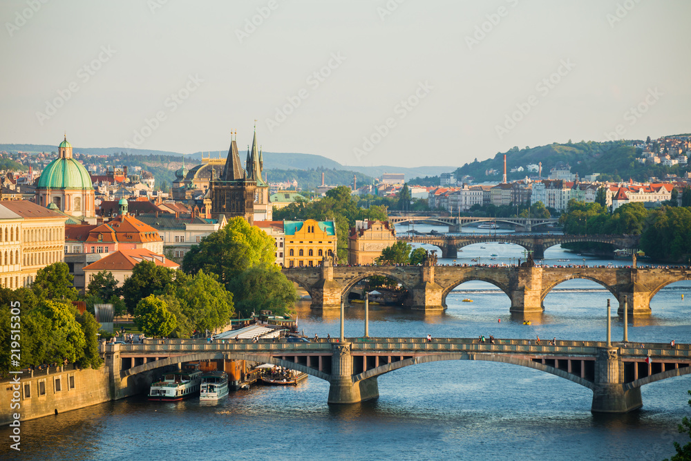 Scenic spring sunset aerial view of the Old Town pier architecture and Charles Bridge over Vltava river in Prague, Czech Republic - obrazy, fototapety, plakaty 