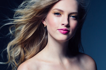 beautiful blonde woman with pink lipstick beauty model