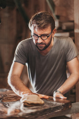 Wall Mural - Artisan Carpenter Working in his Workshop