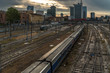 milano skyline over the station at sunrise with cloudy sky