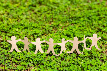 human chain on green plant (csr)