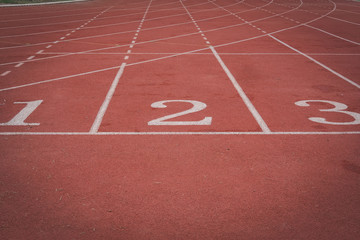 lane number & running racetrack, backstretch in outdoor sports stadium arena