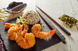 Crispy golden tempura shrimps with rice
