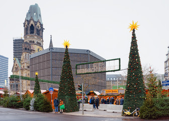 Wall Mural - Christmas Trees Christmas Market Kaiser Wilhelm Memorial Berlin