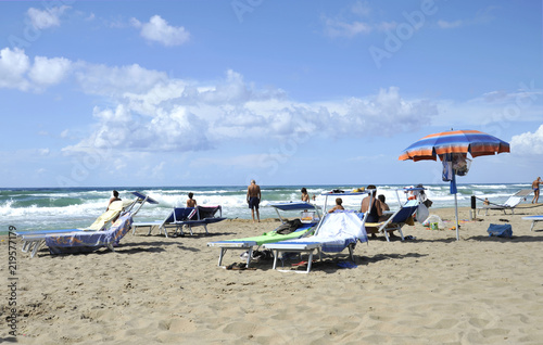 Relaxed People On The Sabaudia Beach For Summer Holidays Relaxed People On The Sabaudia Beach For Summer Holidays Sea Background