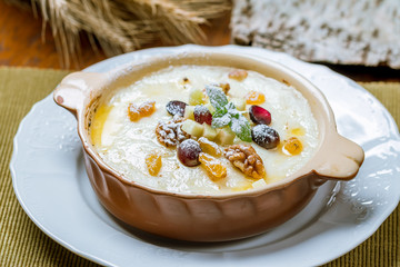 Wall Mural - Semolina porridge with fruits and nuts