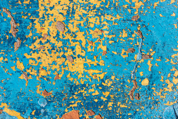 Wall Mural - background. original cracked plaster painted in blue and yellow colors