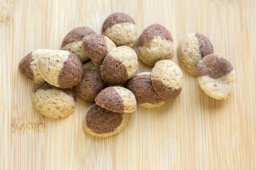 Cinnamon sandbakelse christmas cookies, two color, cocoa dark brown and vanilla light golden brown, delicious czech cookies