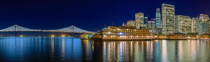 San Francisco Belle and downtown at Christmas from wooden Pier 7 at sunset.