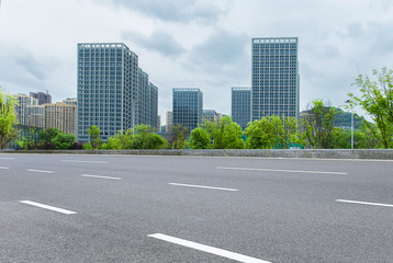 Modern city and asphalt highway