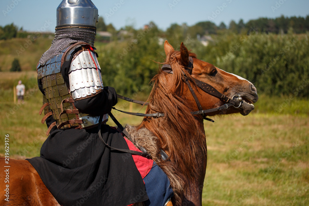 Medieval armored knight on horse from fantasy. Equestrian soldier in ...